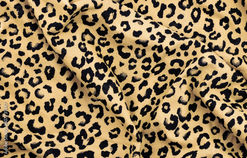 Abstract background with leopard texture, cotton fabric