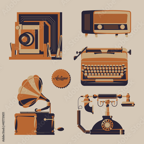 A vector set of antique items: camera, radio receiver, gramophone, telephone and typewriter