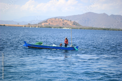 Fishermen in the middle of the sea