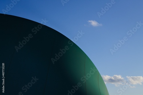 Clouds in the sky behind a pressure switch structure with a plastic cover of a sports building  Pesaro  Italy  Europe 