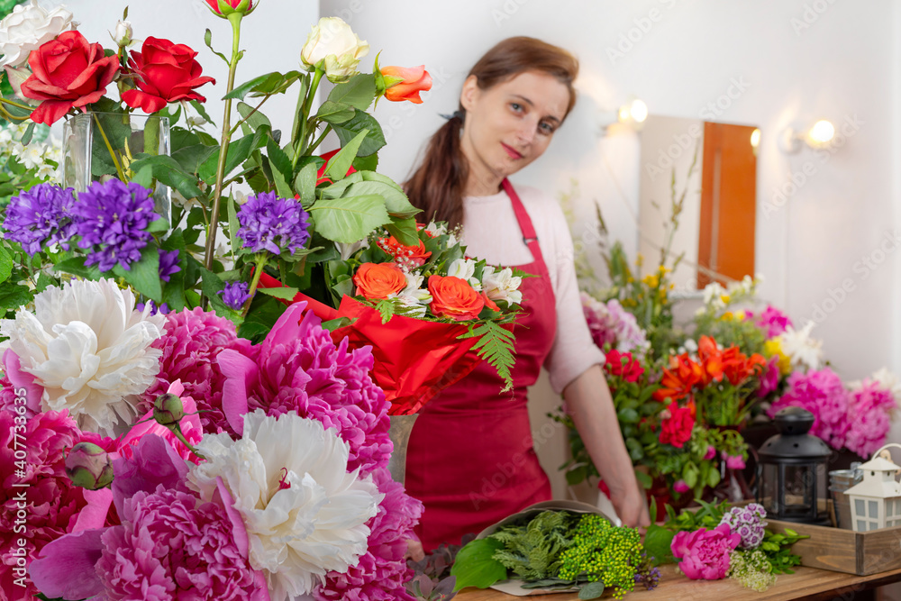 Crop view saller of flowers. Floristic business.DIY arrangement of bouquets. Crop view saller of flowers. Floristic business.DIY arrangement of bouquets.