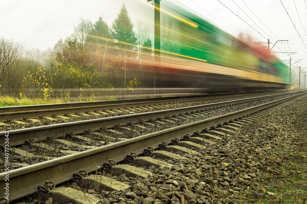 Fast speed train on metal steel rails