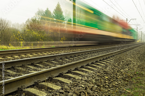 Fast speed train on metal steel rails