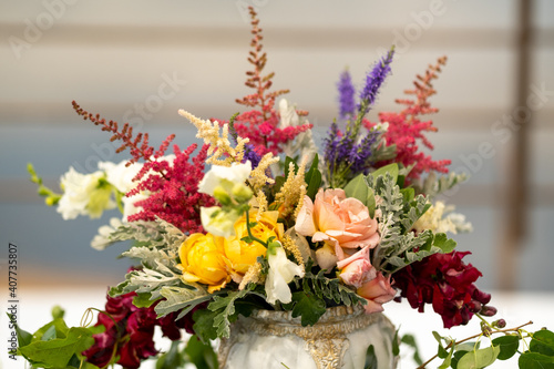 wedding table decoration with flowers on the table in the castle, table decor for dinner by candlelight.Dinner with candles photo