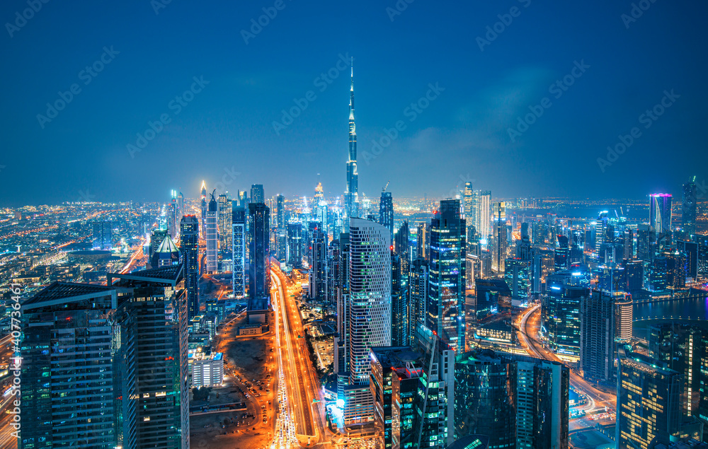 Modern Dubai city skyline at the sunset and beautiful city center, Dubai, United Arab Emirates