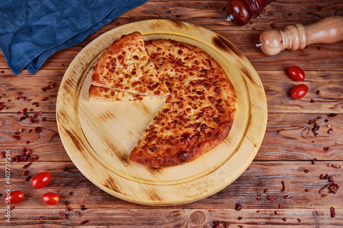 Khachapuri with cheese, traditional Georgian cuisine photo