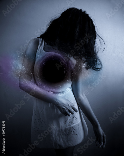 woman with a black hole in her chest representing a depression
