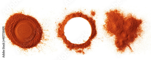 Obraz na plátně Set pile of red paprika powder isolated on white background, top view