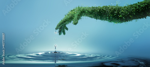 Water preserve concept, nature in shape of human hand dropping a water drop with rings and small splash #407738887