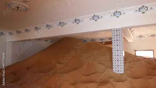 Sand Dune Reaches The Ceiling Of Abandoned Home In Al Madam Ghost Town