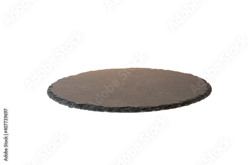 Black slate   round stone plate . Kitchen stone tray for food isolated on white background