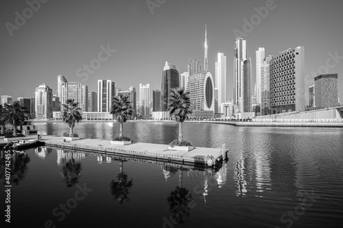 Dubai skyline with reflection in the river at sunrise , Dubai, United Arab Emirates 