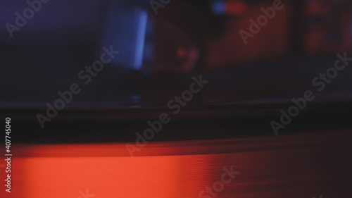 Wallpaper Mural A vinyl record spins in the gramophone music player and plays an old disco. Close-up shot of retro vinyl record player Torontodigital.ca