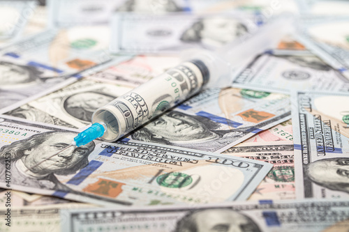 Wallpaper Mural Syringe with 100 dollar banknote inside on dollar banknotes Torontodigital.ca