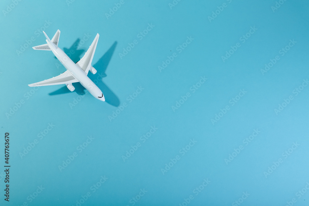 toy airplane on blue background top view with space for text toy airplane on blue background top view with space for text