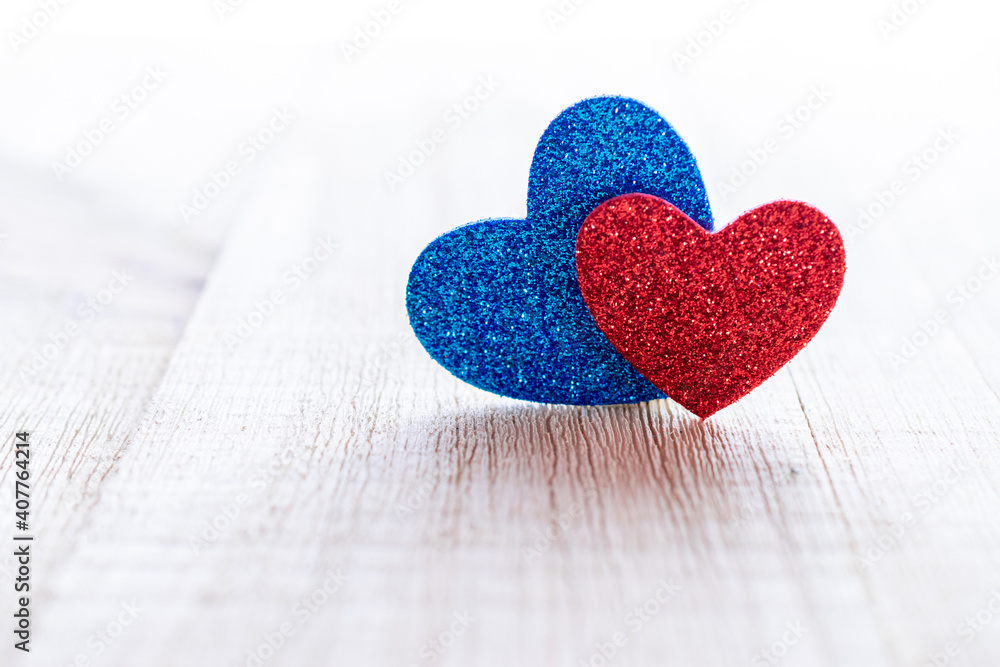 Fototapeta premium Valentines day minimal: red love hearts candle on wooden background. Sainte Valentine, mothers day, birthday greeting cards, invitation, celebration concept.