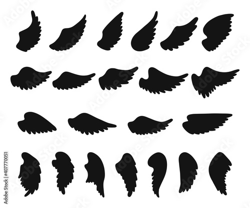 Set of hand drawn angel or bird wings silhouettes. Monochrome drawing elements. 