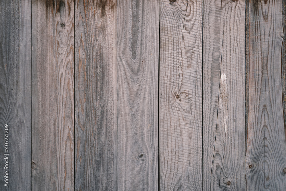 Naklejka premium Old wooden fence background texture close up