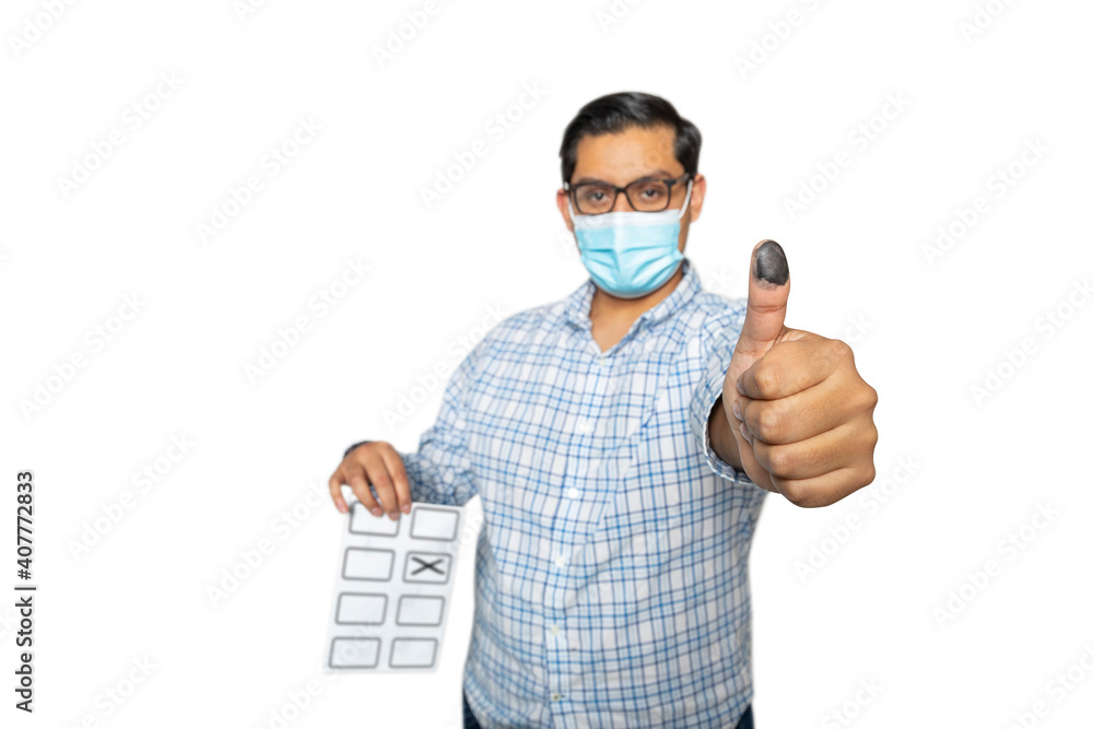 Man with mask happy casting his vote Man with mask happy casting his vote