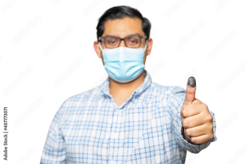 Man with mask happy casting his vote Man with mask happy casting his vote