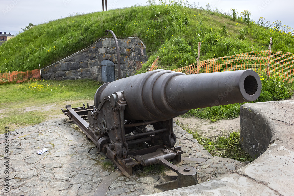 Historic Naval guns of Suomenlinna. Suomenlinna (Sveaborg) - sea fortress, which built gradually from 1748 onwards on a group of islands belonging to Helsinki district. Helsinki, Finland. Historic Naval guns of Suomenlinna. Suomenlinna (Sveaborg) - sea fortress, which built gradually from 1748 onwards on a group of islands belonging to Helsinki district. Helsinki, Finland.