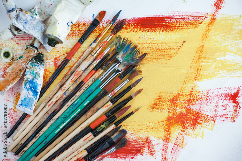 Brushes and paints for painting on an old background. Brushes and paints for painting on an old background.