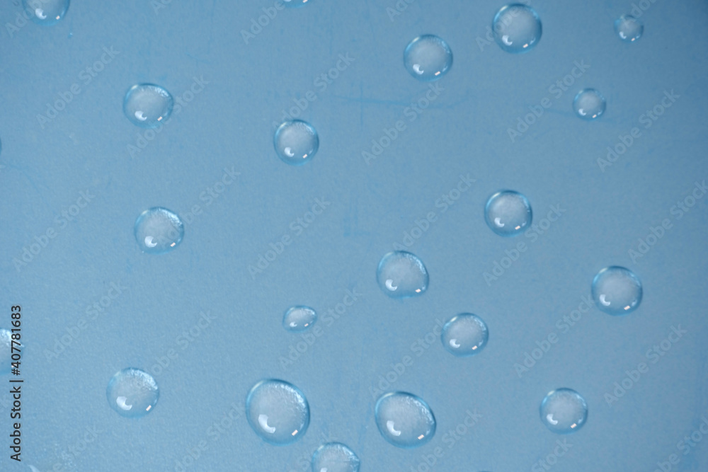 small drops of water on gray-blue background