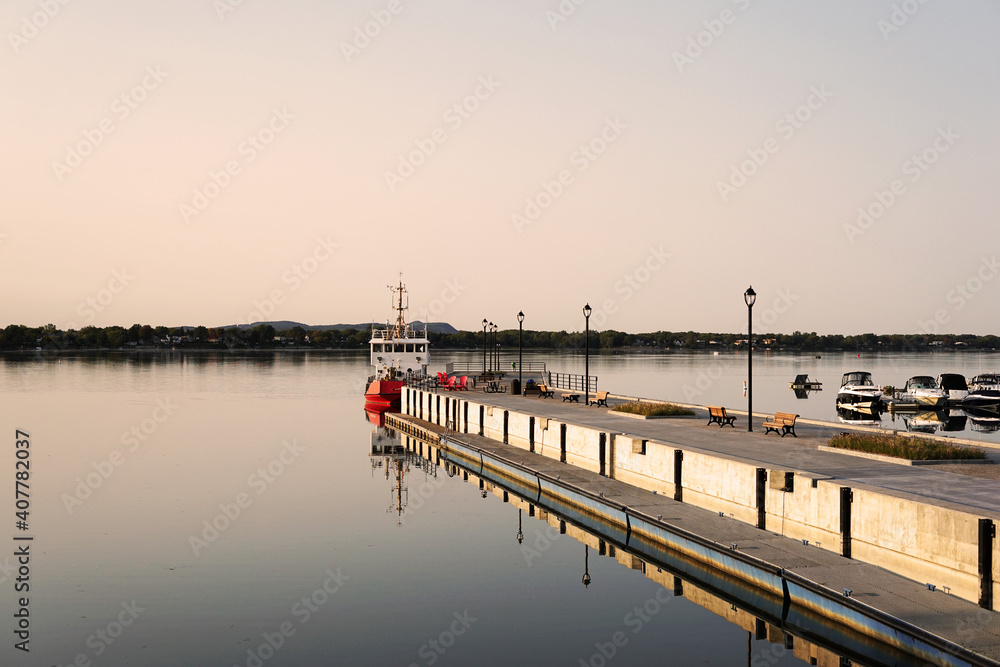 Berth filled with various boats on the lake, flat water, summer, Chambly, Quebec, Canada