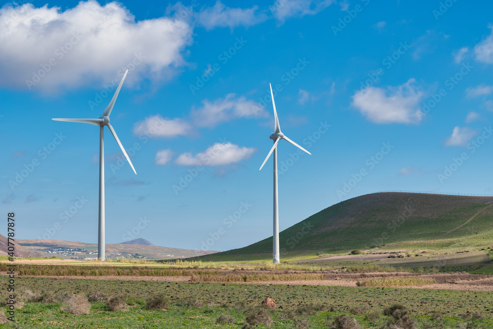 Landscape and renewable energy wind turbines on the island of Lanzarote, Canary Islands Landscape and renewable energy wind turbines on the island of Lanzarote, Canary Islands