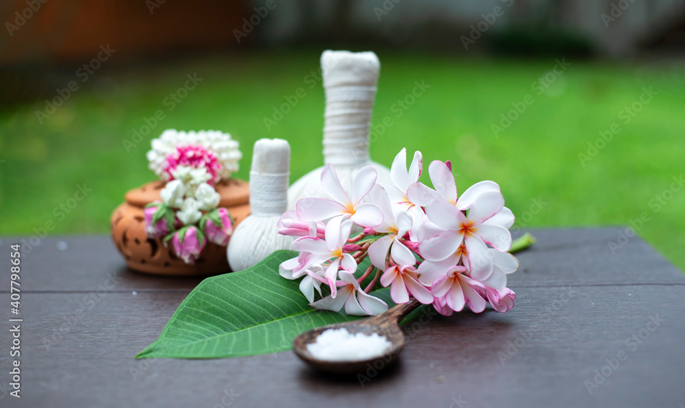 Spa massage compress balls, herbal ball on the wooden with treaments spa Spa massage compress balls, herbal ball on the wooden with treaments spa