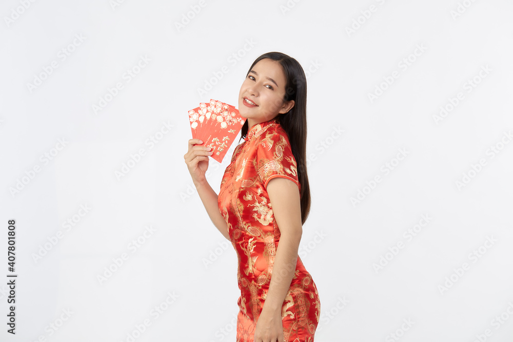 Asian woman in traditional red cheongsam dress Asian woman in traditional red cheongsam dress