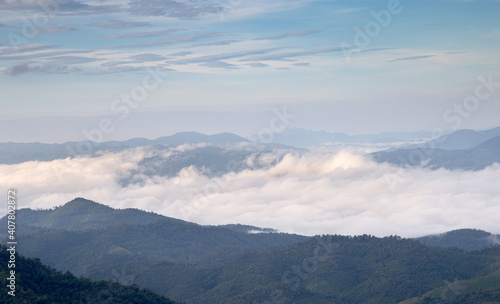 Morning view on the mountain full of fog on top. © Salaithip