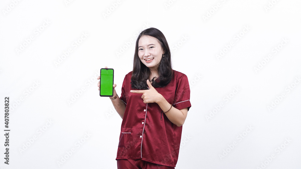 woman wearing pajama hold green screen phone isolated white background woman wearing pajama hold green screen phone isolated white background