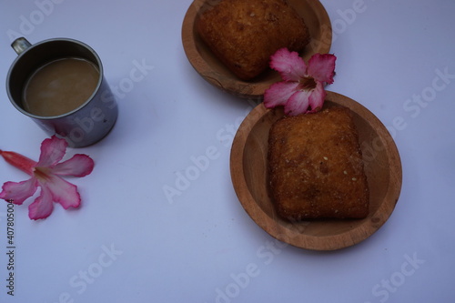 Frangipani flowers, cup of coffee and 