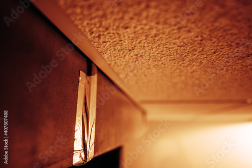 metallic aluminum foil tape covering HVAC duct connection joint