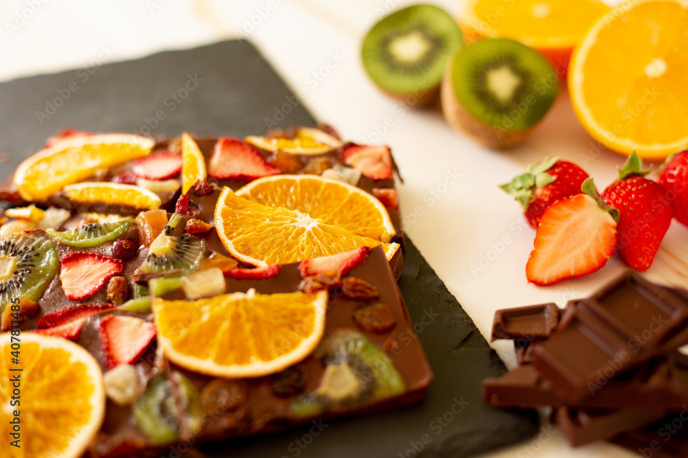 Dried fruits chocolate bark and fresh fruits Dried fruits chocolate bark and fresh fruits