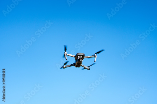 Wallpaper Mural DJI Mavic Pro flying in the blue sky isolated Torontodigital.ca