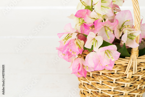 bougainvillea flora local flowers of asia in basket arrangement  flat lay style on background white © phenphayom