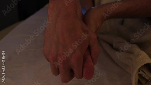 Relaxing Thai foot massage. Spa salon treatments. Masseur and patient.