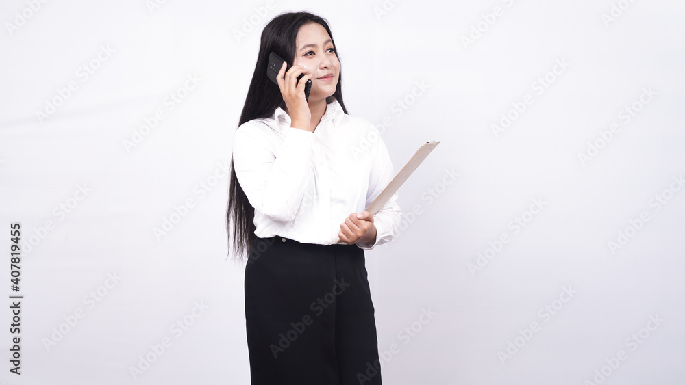 asian business woman hold clipboard isolated white background with telephone asian business woman hold clipboard isolated white background with telephone