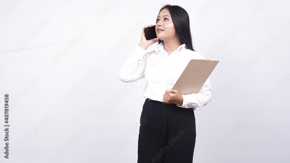 asian business woman hold clipboard isolated white background with telephone asian business woman hold clipboard isolated white background with telephone