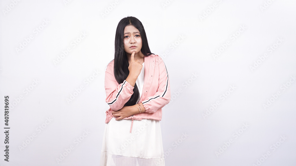 beautiful asian woman thinking and get idea isolated blue background beautiful asian woman thinking and get idea isolated blue background