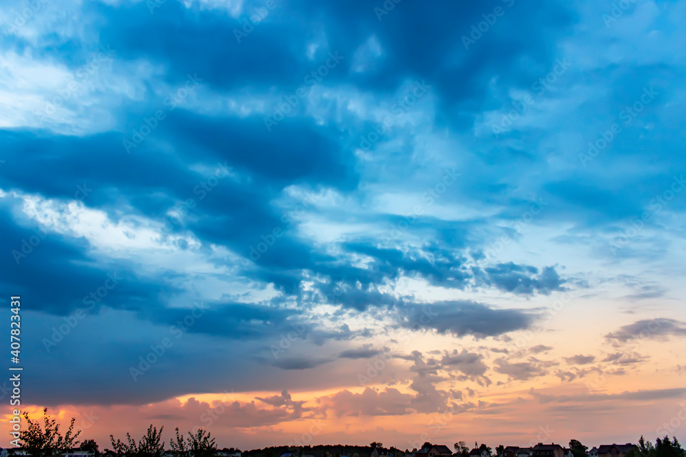 Sunset sky with multicolor clouds. Dramatic sky at sunset. Sunset sky with multicolor clouds. Dramatic sky at sunset.