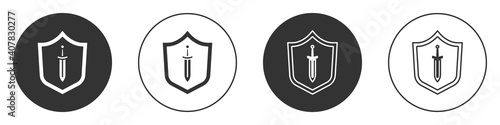 Black Medieval shield with sword icon isolated on white background. Circle button. Vector.
