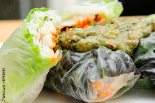 rice paper wrapped chicken with vermicelli noodles and a thai pe photo