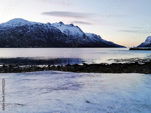 Scenic view of a calm Fjord lake in Ersfjordbotn in Norway photo