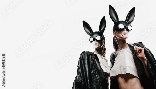 Photography masked easter bunny blowing bubble gum bubbles