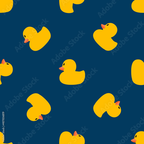 Cute pattern with yellow ducks on a blue background