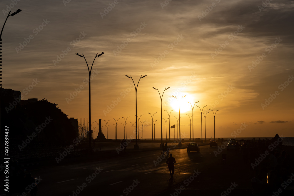 Sunset at the malecón in central Havana, close to the Hotel Nacional in Cuba 