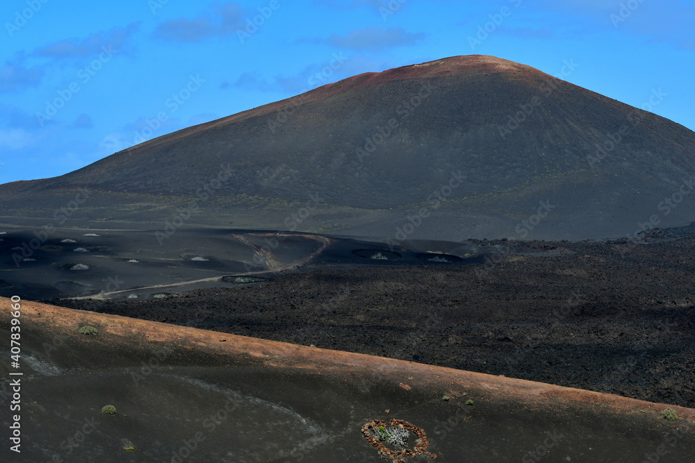 Beautiful volcanic landscape at the Parque Natural de Los Volcanes. Lanzarote, Spain.